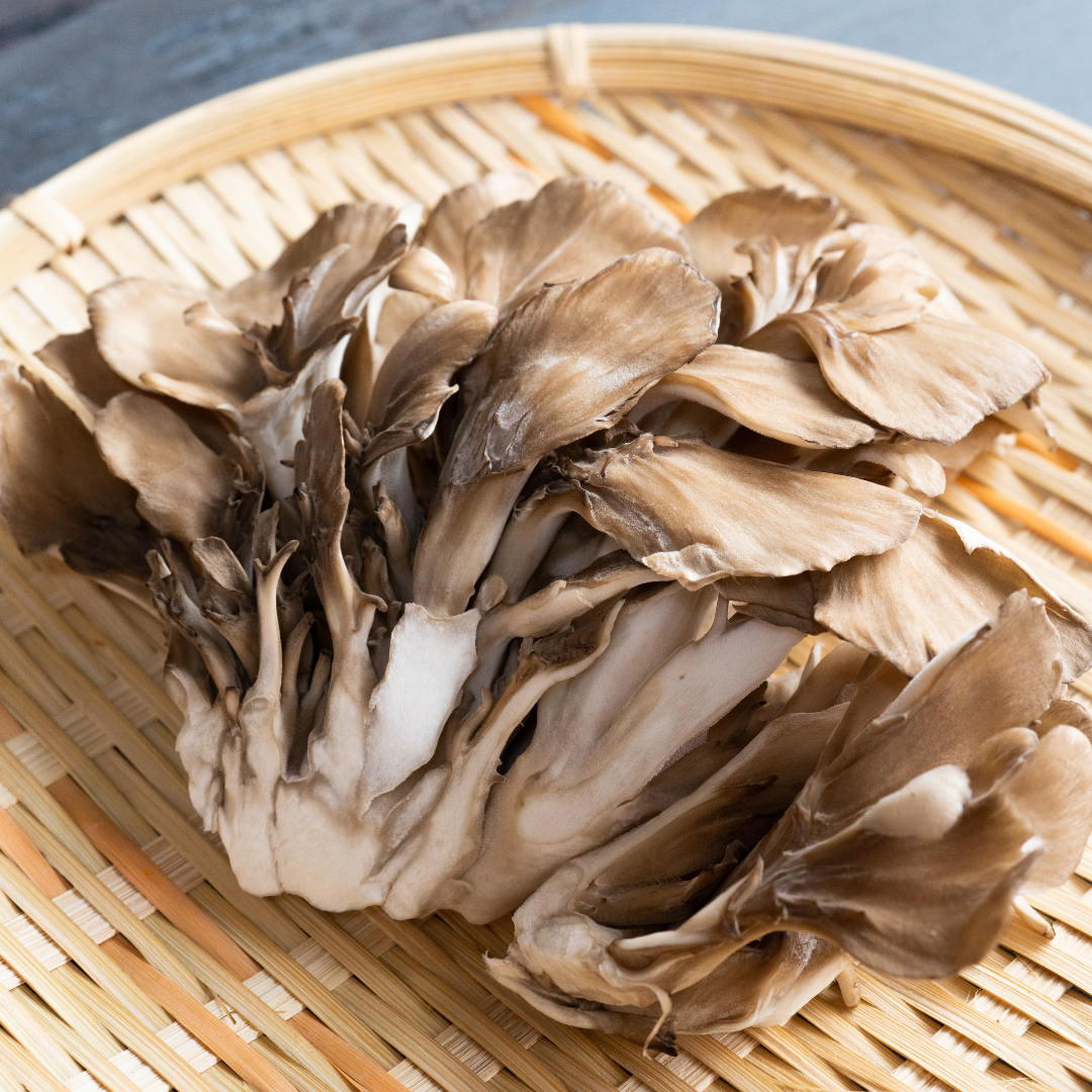 Maitake mushrooms being prepared in the kitchen, fresh and flavourful.